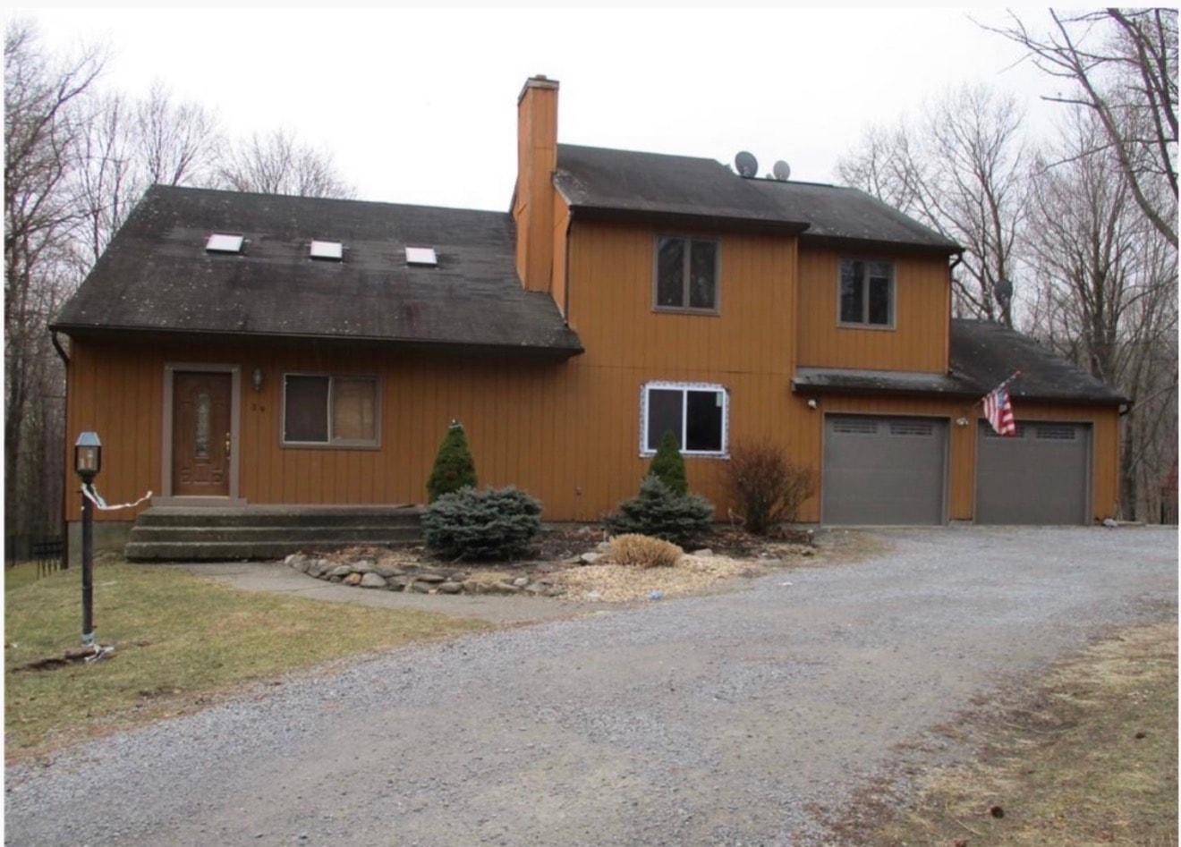 Brown house exterior before renovation